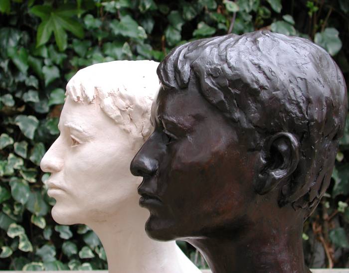 Bronze bust and terra cotta bust side by side